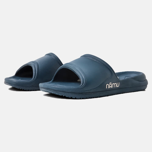 Pair of blue slides with 'númu' branding on a white background